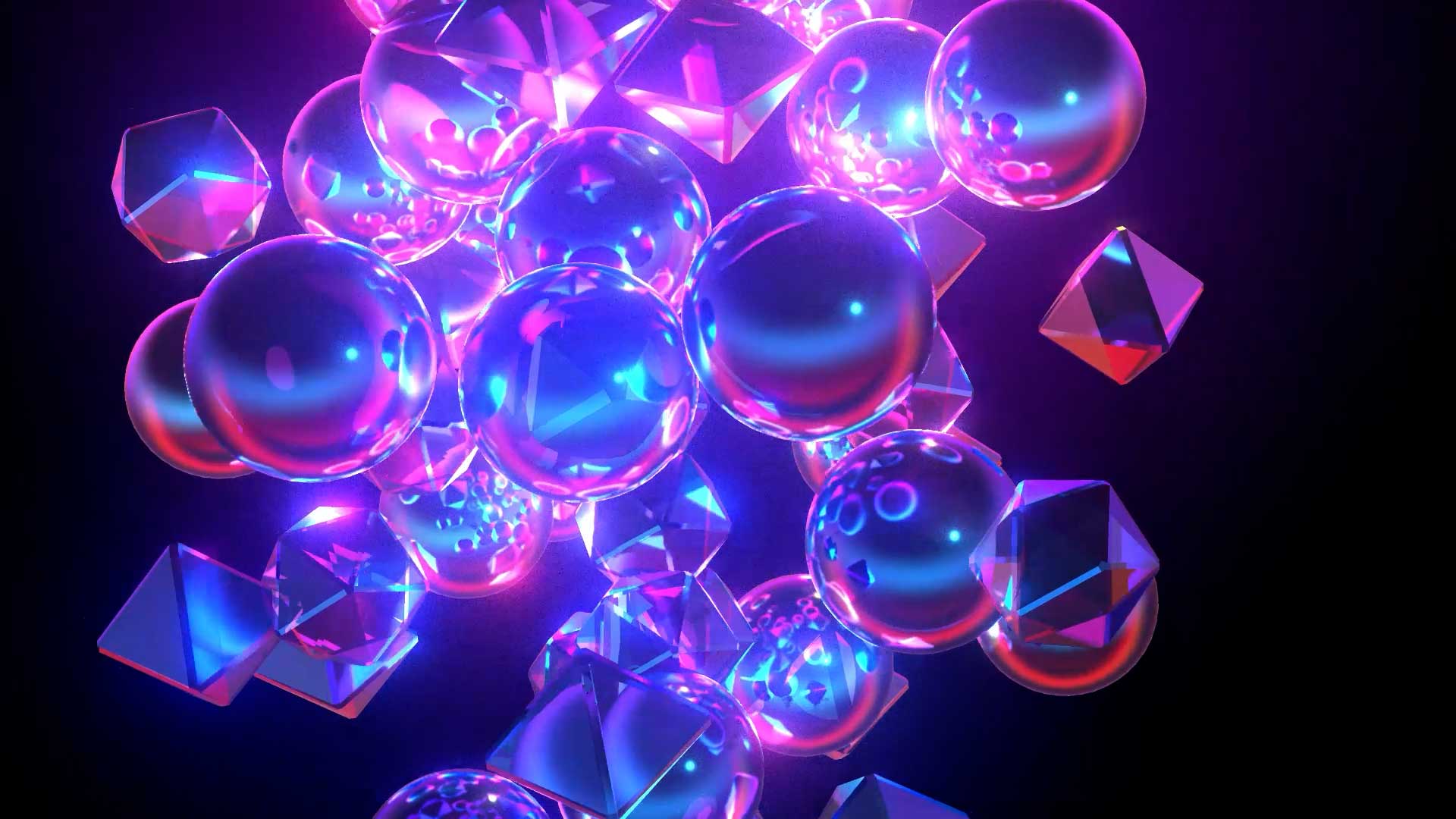 Glass spheres and faceted polyhedra catching coloured light, reflecting each other and refracting what is behind them.